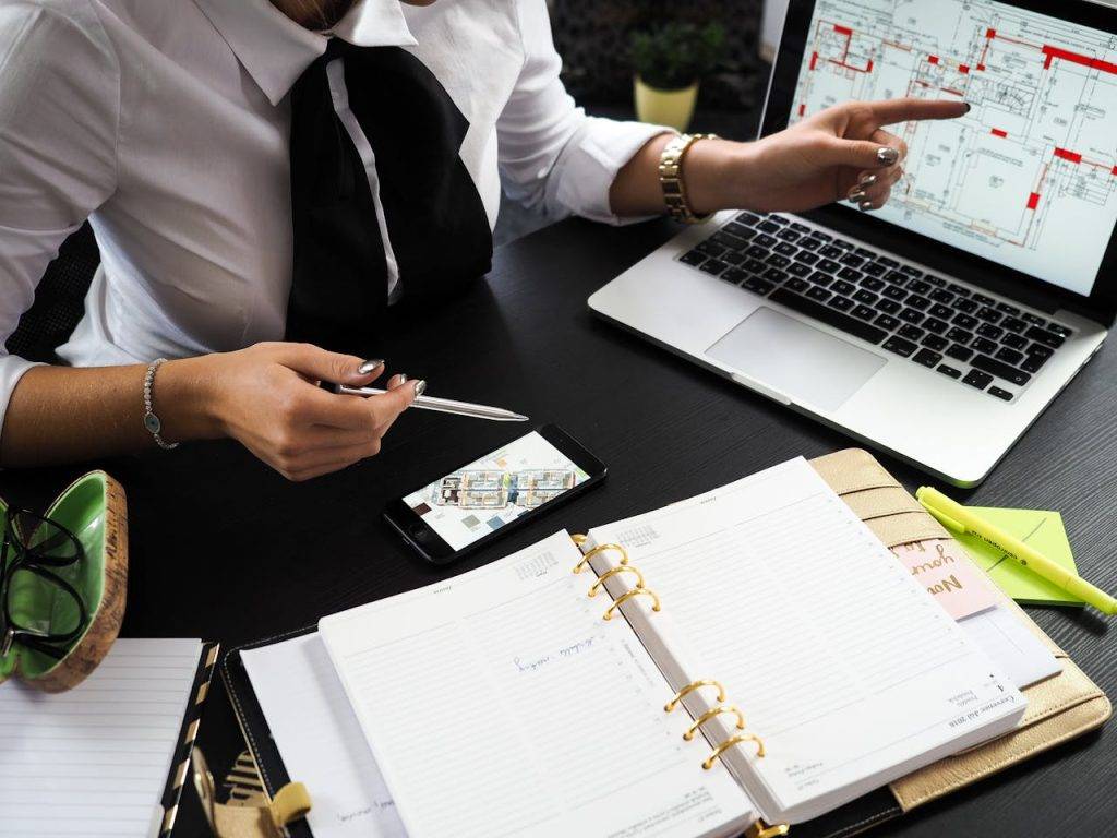 people working with a real estate transaction coordinator