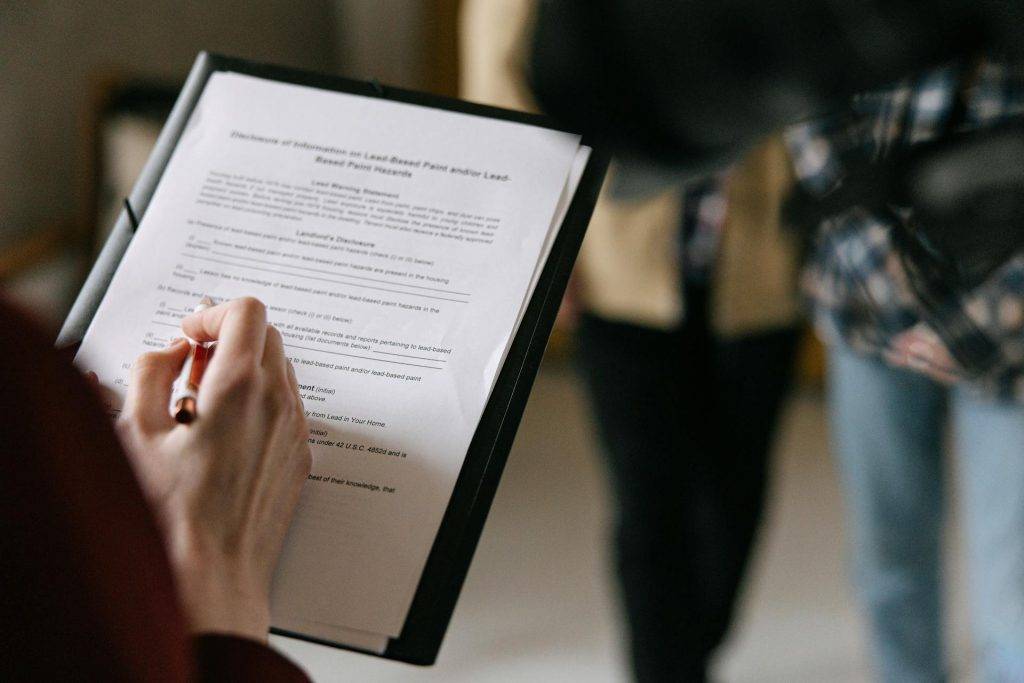 a person going over a real estate contract