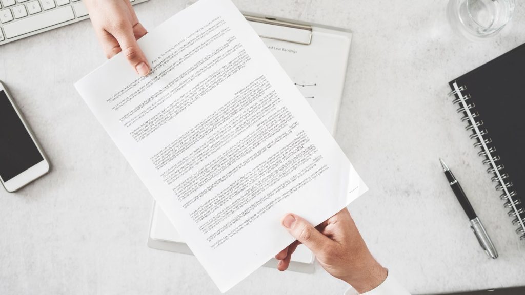 two people reviewing a contract